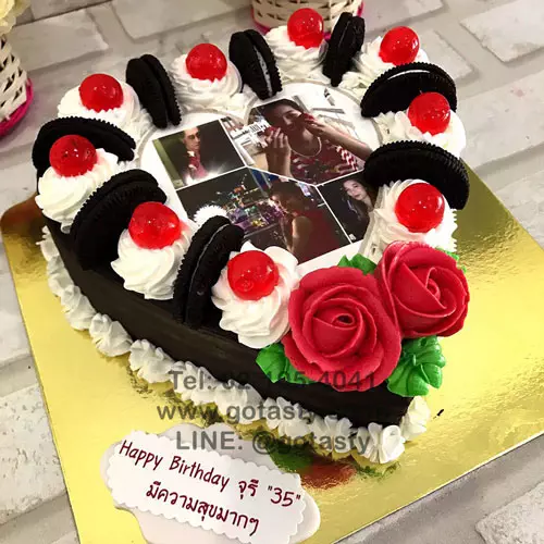 Chocolate white cream photo cake with jelly, rose and Oreo decorations