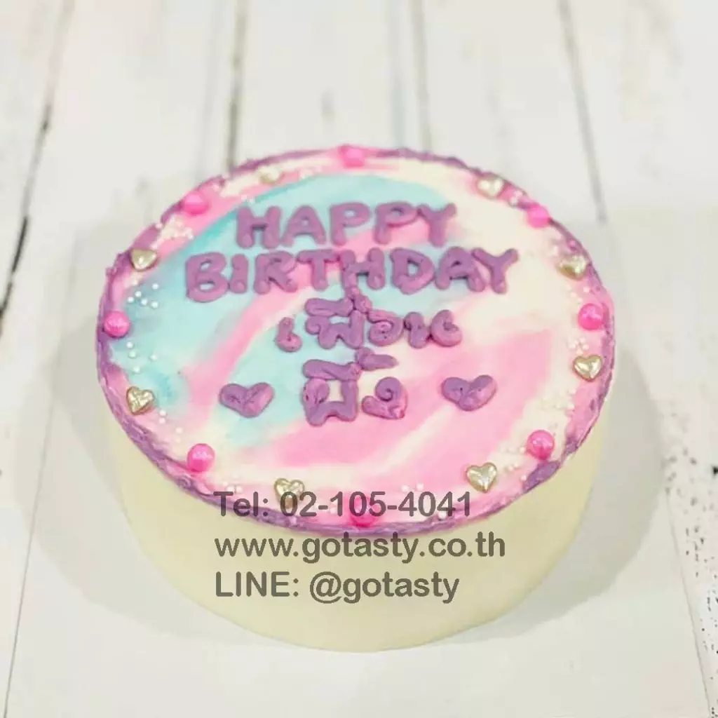 Pink white and blue birthday cake