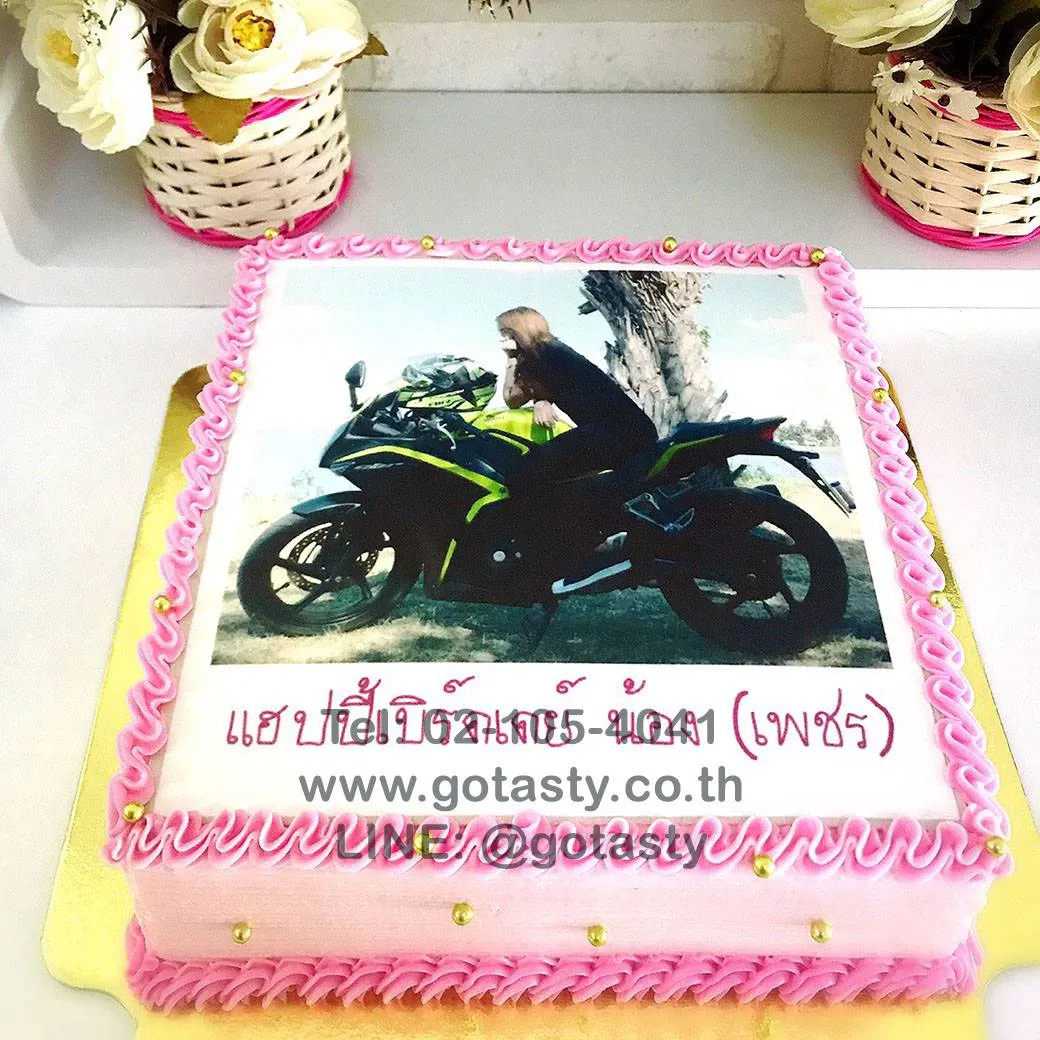 Pink and white cream birthday cake