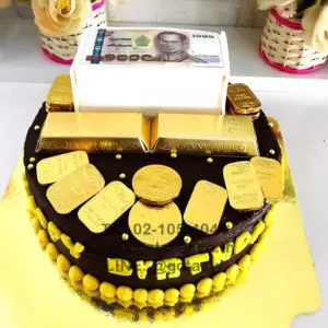 Money and gold chocolate cake
