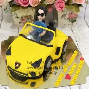 Yellow car and man fondant cake