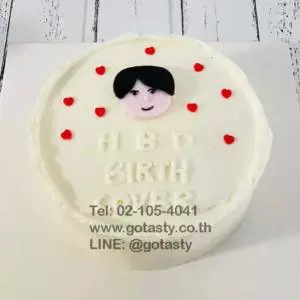 White cream birthday face cake